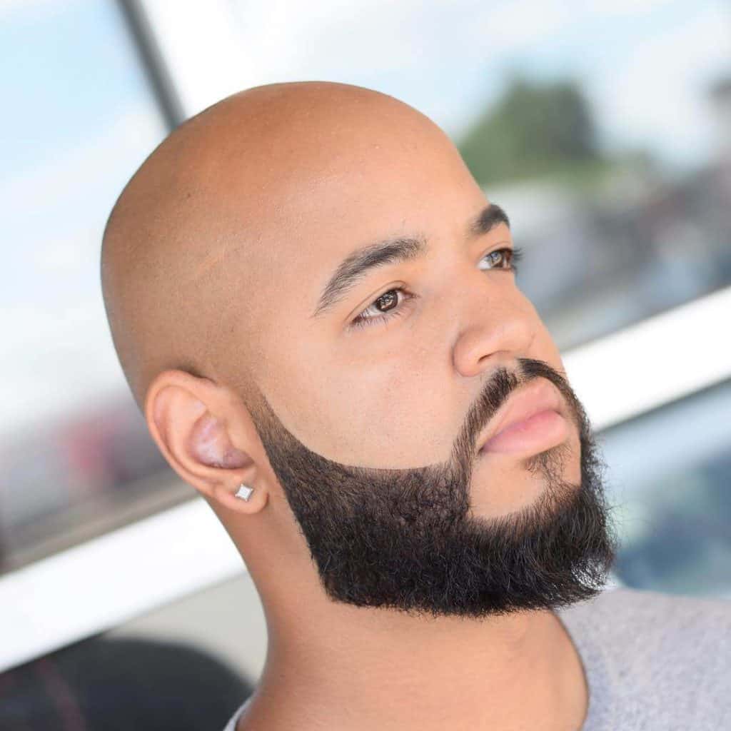 bald man with faded beard