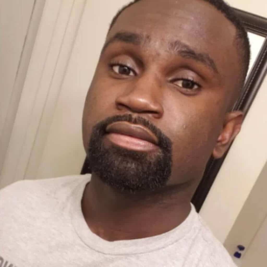 black man with goatee