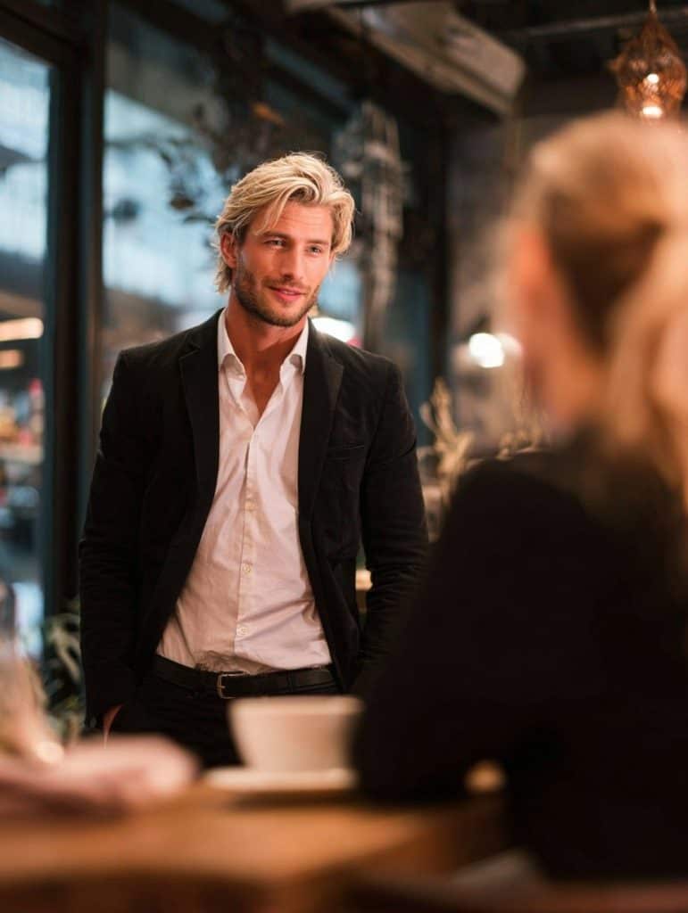 confident_man in a cafe with a woman