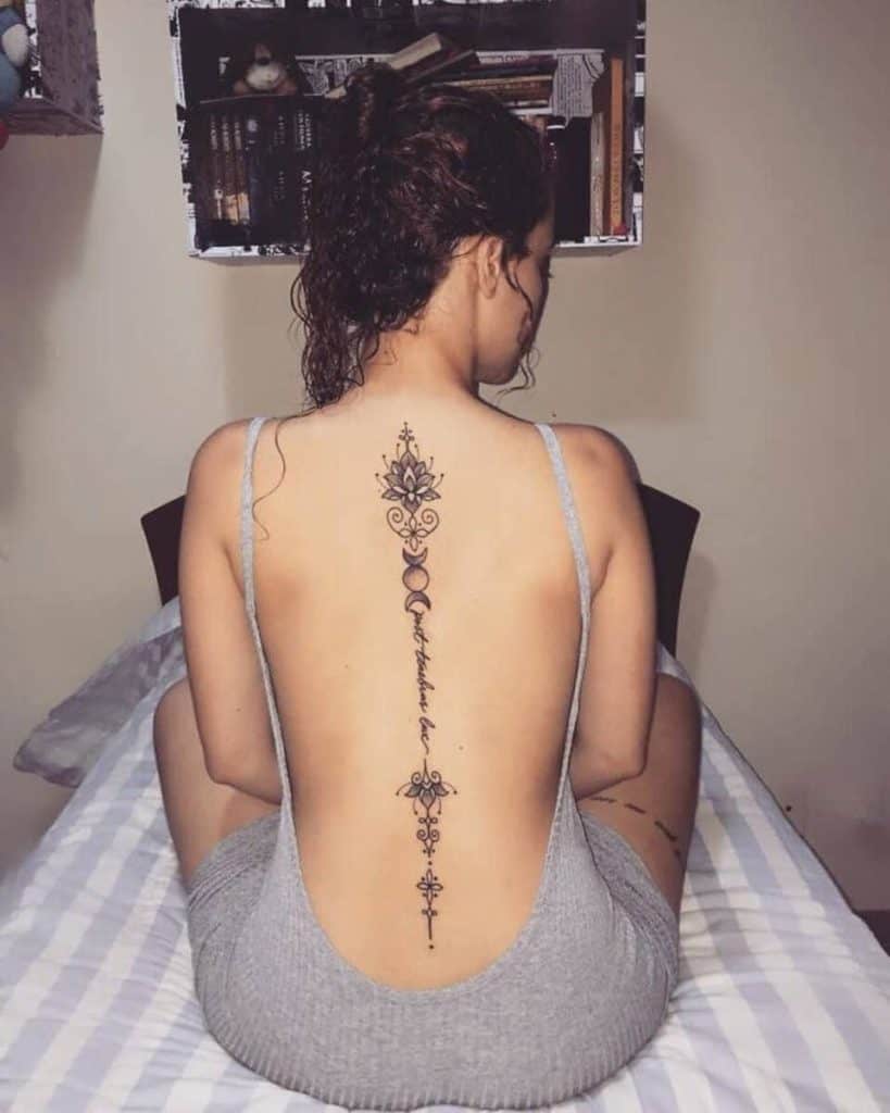 Mandala Designs spine tattoo for women